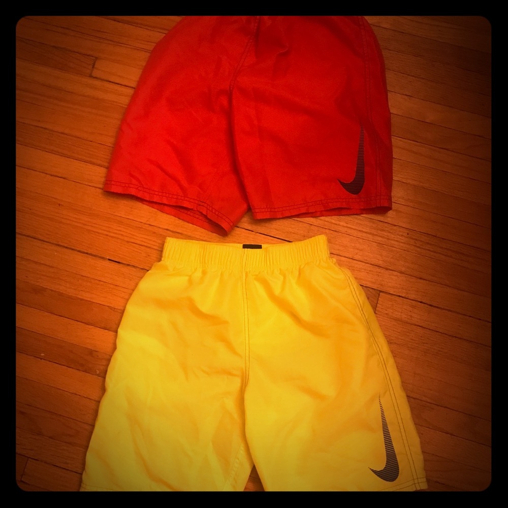 2 boys size large kids Nike swimsuits.  Size L